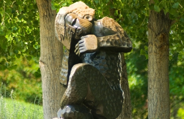 stone sculpture in trees