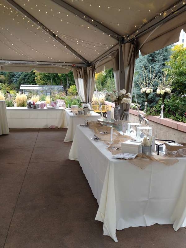 Wedding reception tables set up at the west terrace