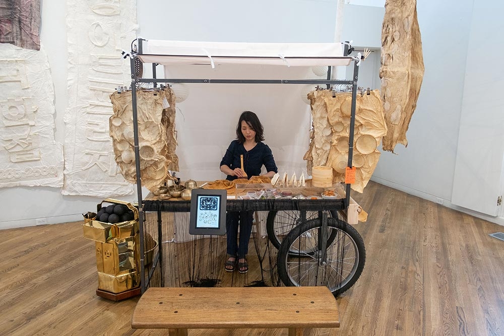 Sammy Lee, “Street Art Cart,” steel tube, bicycle wheel and suitcase, 2018.