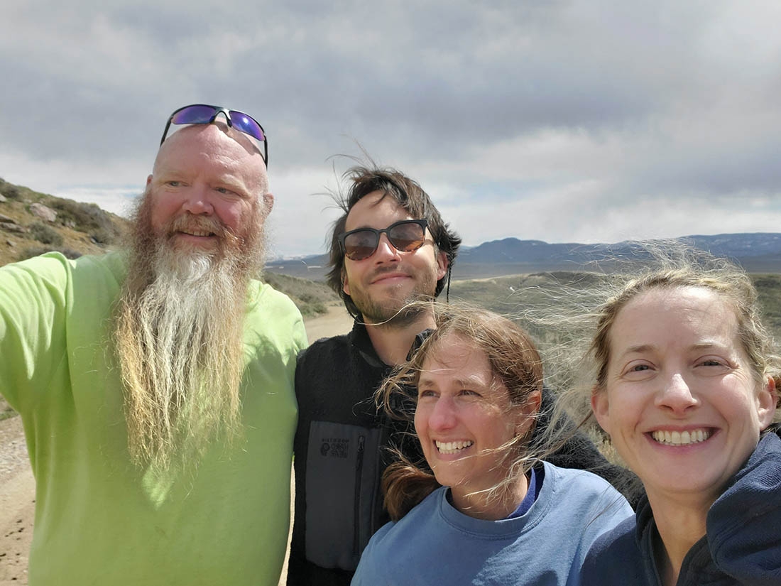 horticulture and research scientists posing for photo in the mountains