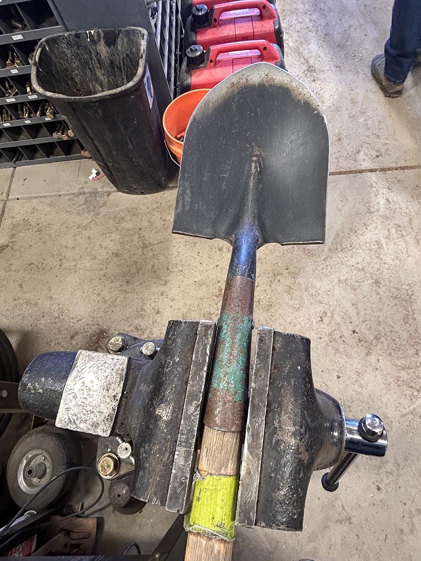 sharpened shovel in vice