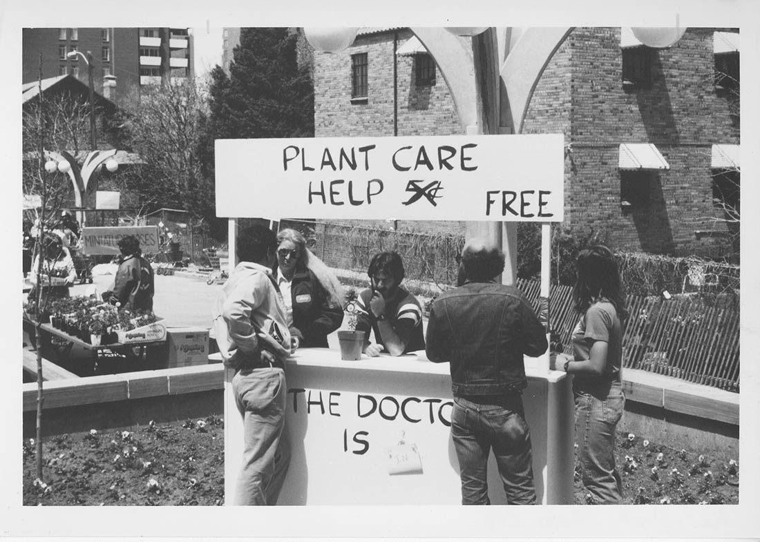 black and white photo plant care booth