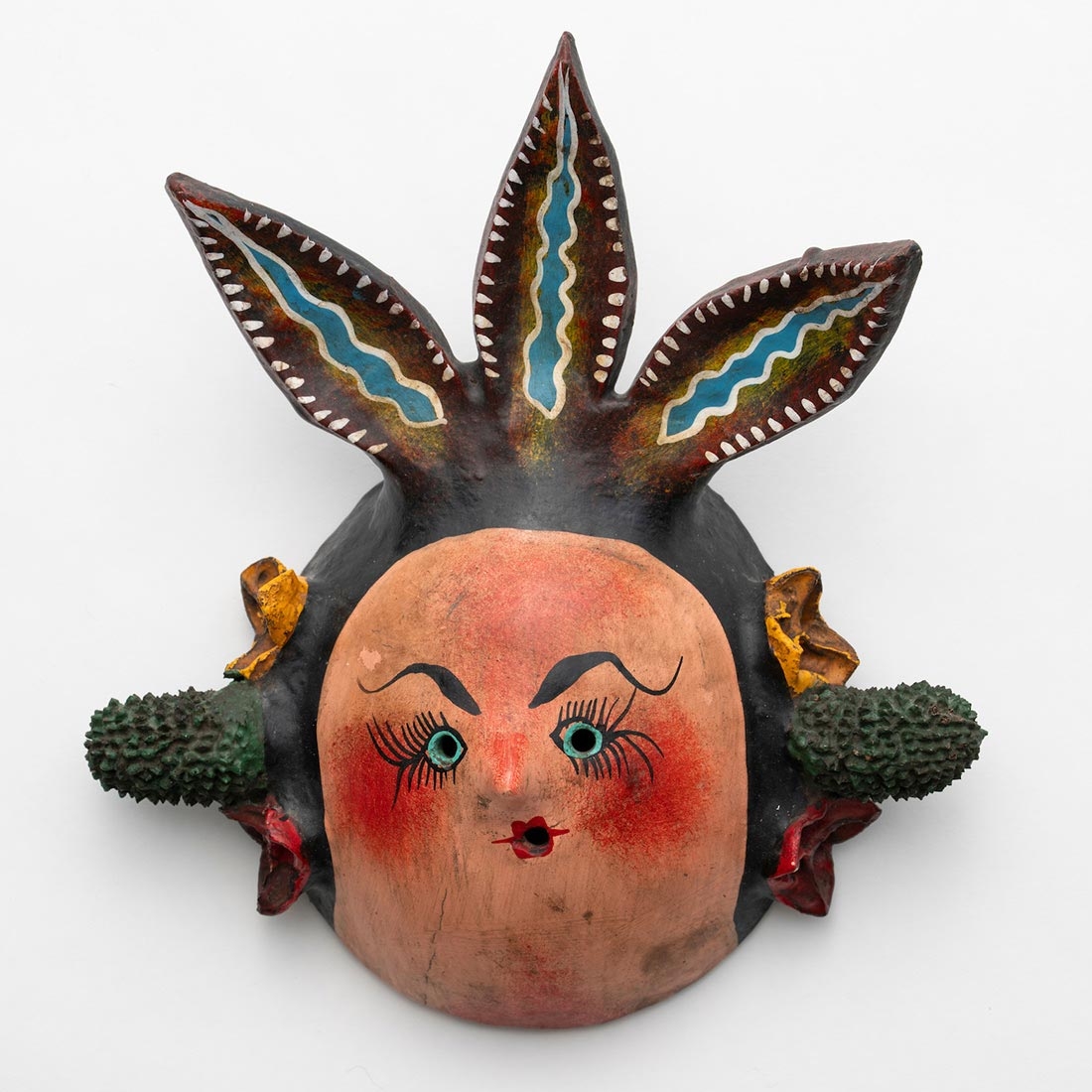 Unknown artist, Mask, coconut, paint and plaster, ca. 1980.