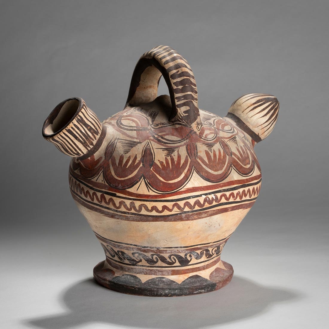 Brown and beige ceramic jar